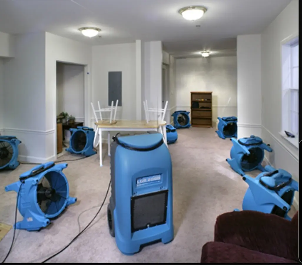 Air movers and dehumidifier setup for Water Damage Restoration in Cairo